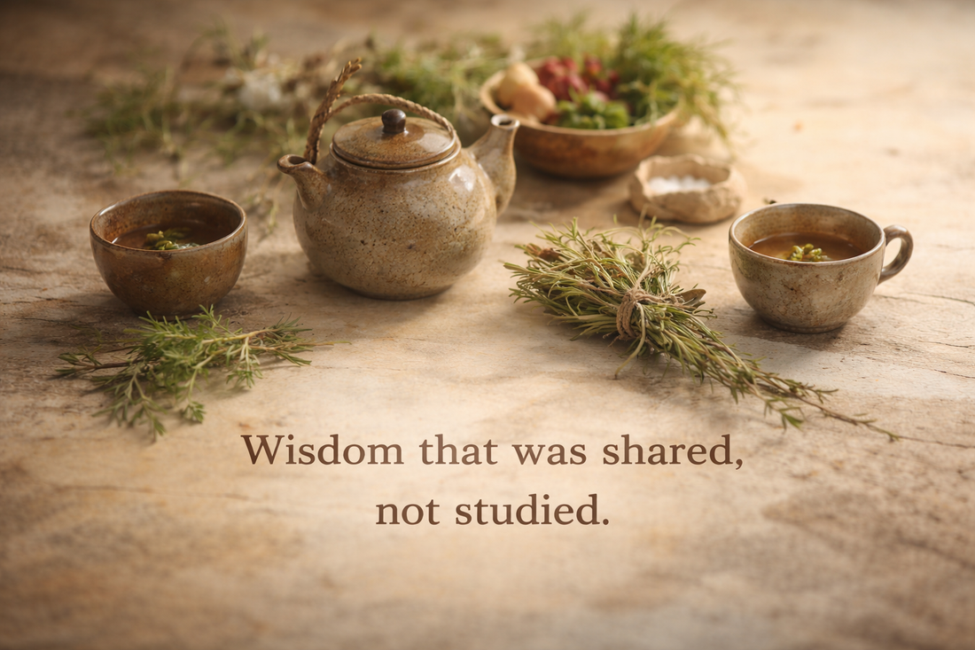 A calm still-life scene with a ceramic teapot and cups resting in natural light, symbolising shared knowledge, quiet rituals, and learning passed through presence.