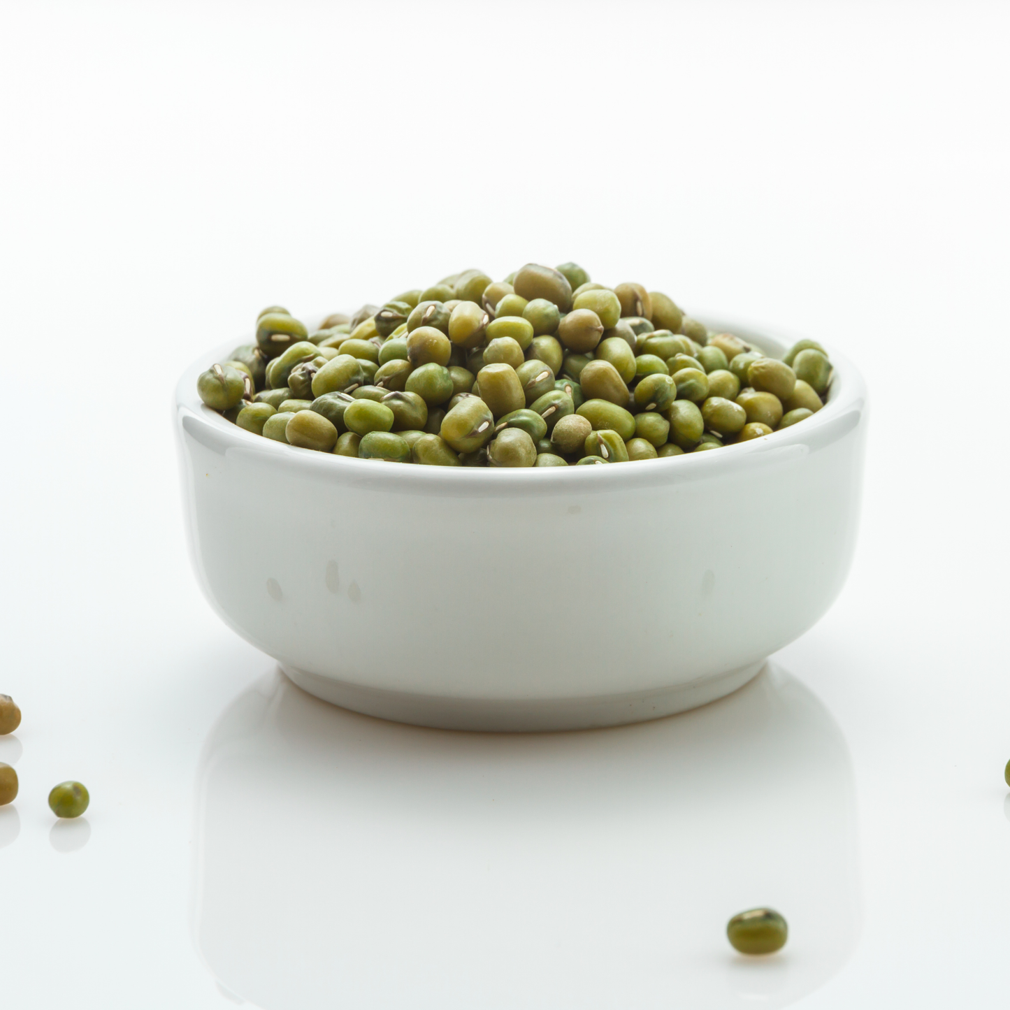 Whole green moong dal unpolished raw lentils close-up